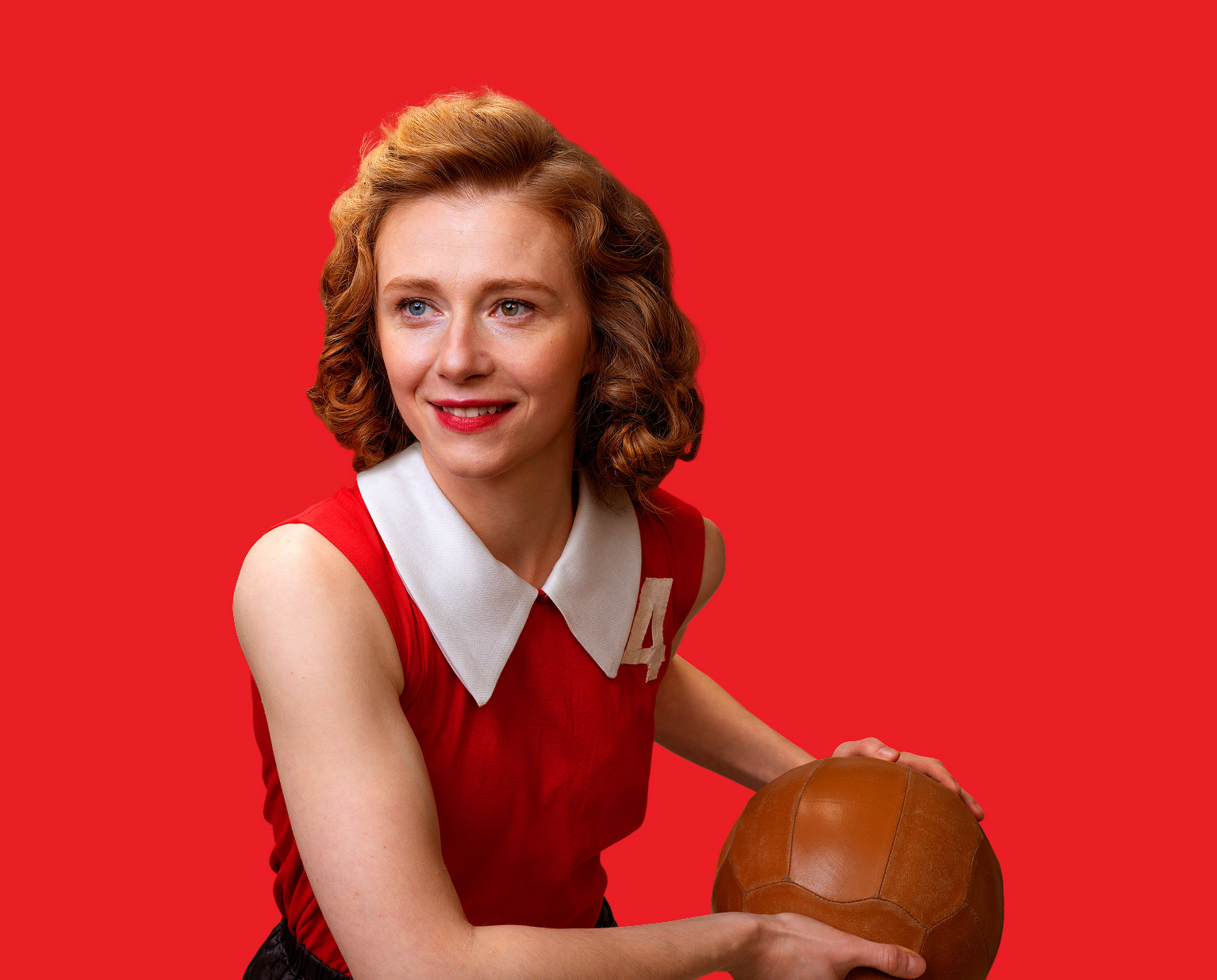 Woman holding a basketball